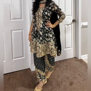 3 piece latest trend black and gold suit .